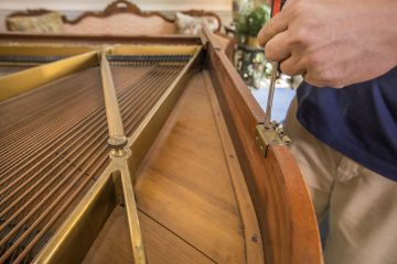 Preparing the piano for moving