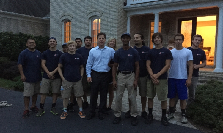 President and CEO Chuck Kuhn and his moving crew