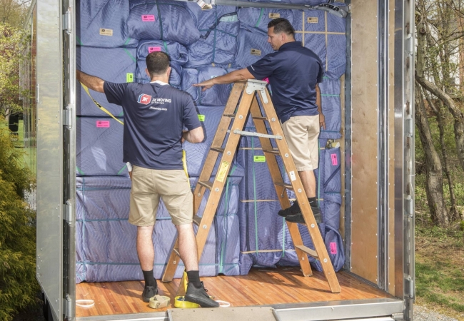 JK Moving professionals loading a truck