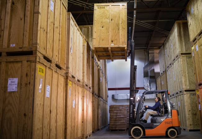 A storage vault forklift