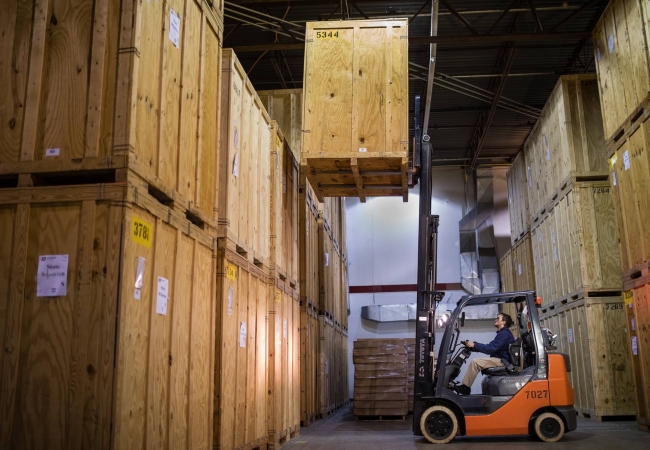 A storage vault forklift