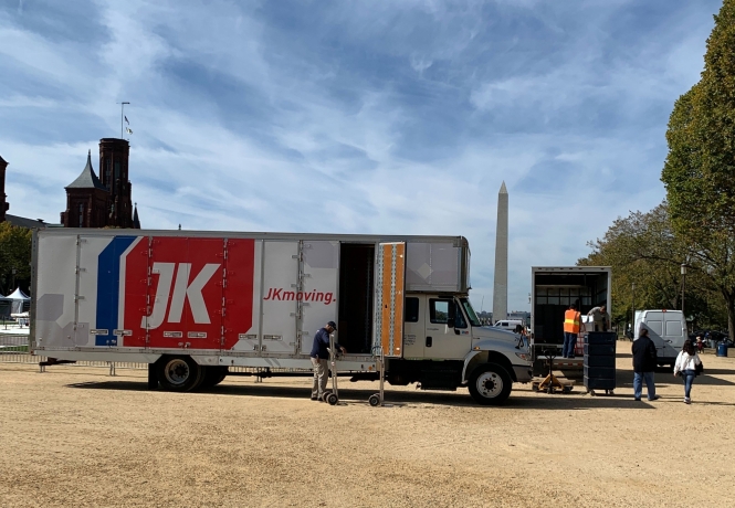Washington Monument framed by a JK Truck