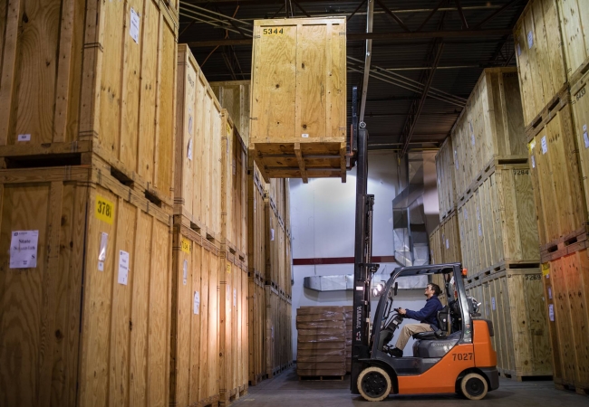 A storage vault forklift