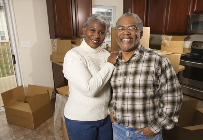 Senior couple in their new home