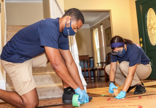 JK Moving professionals protecting home