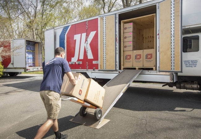 movers loading long distance moving truck