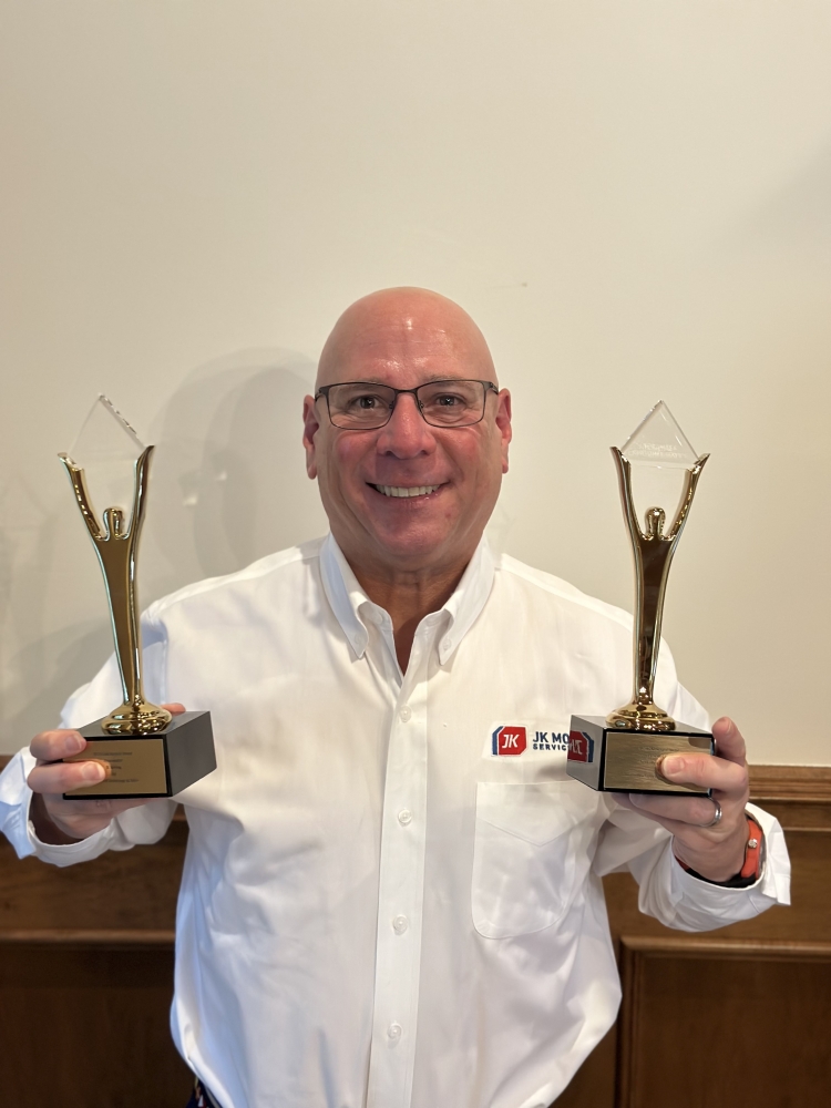 Ken Cohen with Stevie Awards