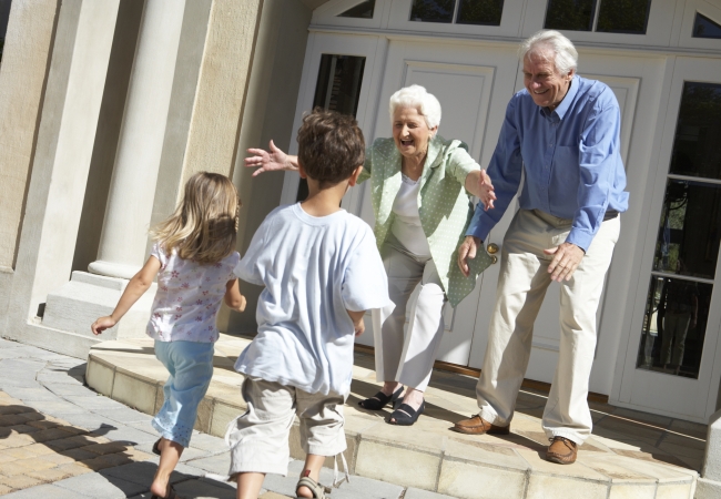 Grandparents sharing joyful moments with their grandchildren.