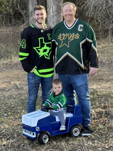 Grandchid and son with dallas stars jerseys