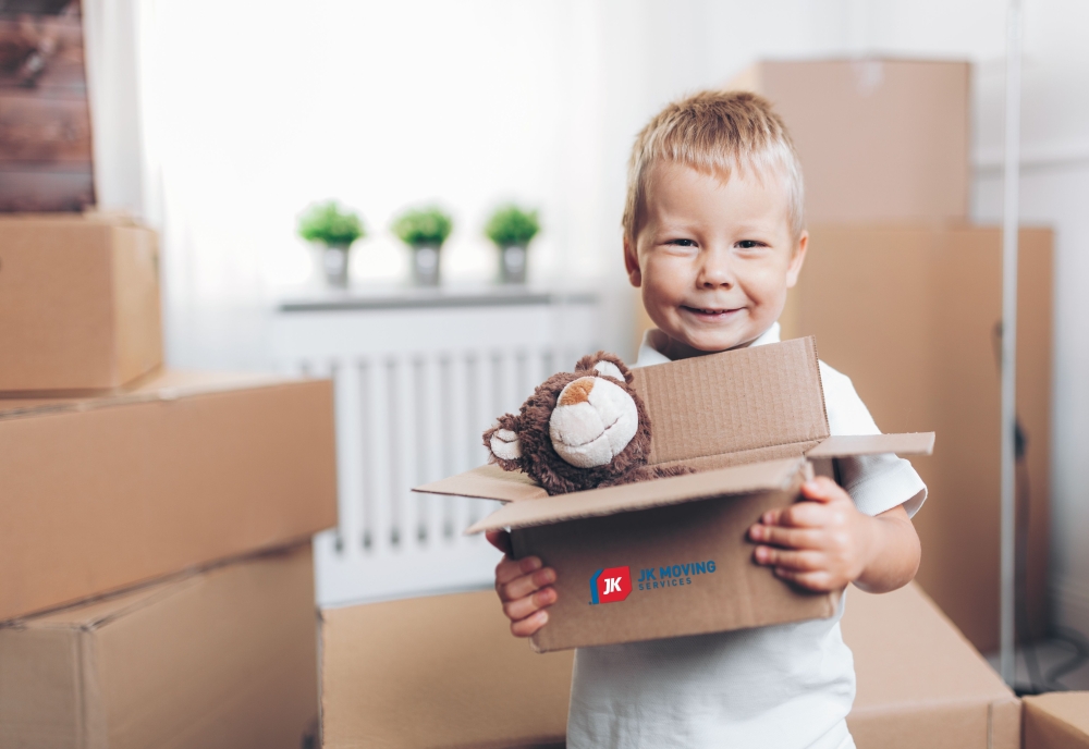 Little boy packing bear