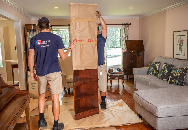 Movers protecting furniture
