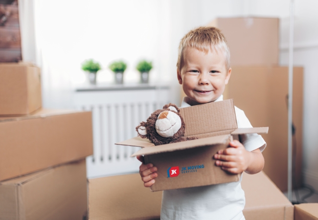 Little boy packing bear