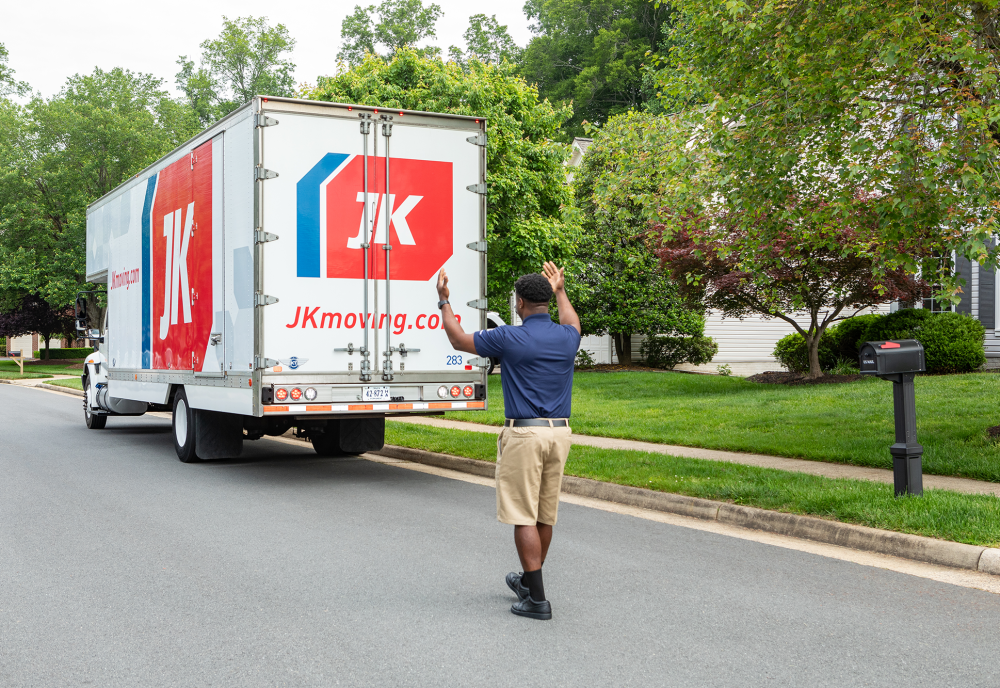 JK Moving truck backing up