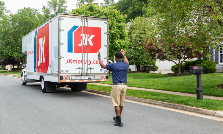 JK Moving truck backing up