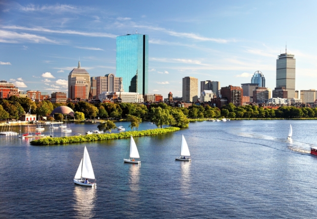 Sailboats on the Charles River with Boston's Back Bay skyline in the background. Boston is the largest city in New England, the capital of the state of Massachusetts. Boston is known for its central role in American history,world-class educational institutions, cultural facilities, and champion sports franchises.