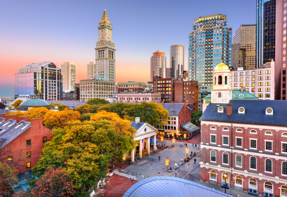Boston, Massachusetts, USA skyline with Faneuil Hall and Quincy Market at dusk.