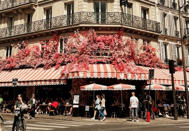 Historic café and shopping area in Le Marais neighborhood Paris